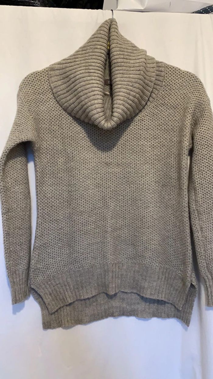 Pull col roulé