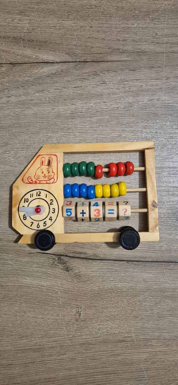 Ancien boulier avec horloge vintage