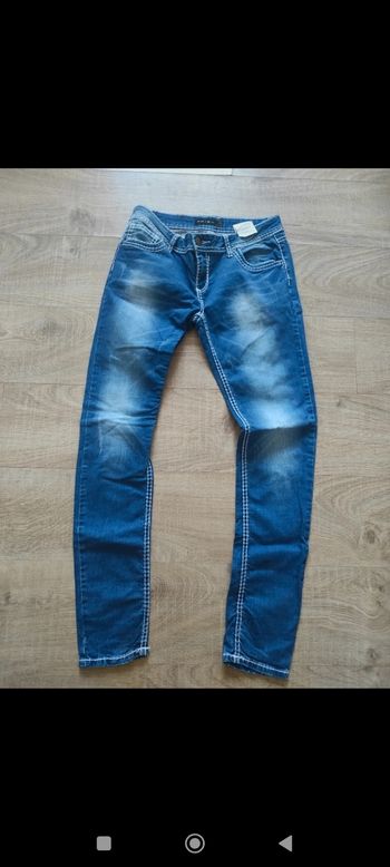 Jean bleu femme Amisu w31  avec surpiqûres blanches