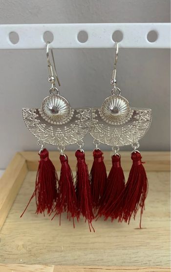 Boucles d'oreilles à pompons marque Moa