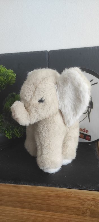 peluche ancienne éléphant gris blanc standing aux nations beige marron rond