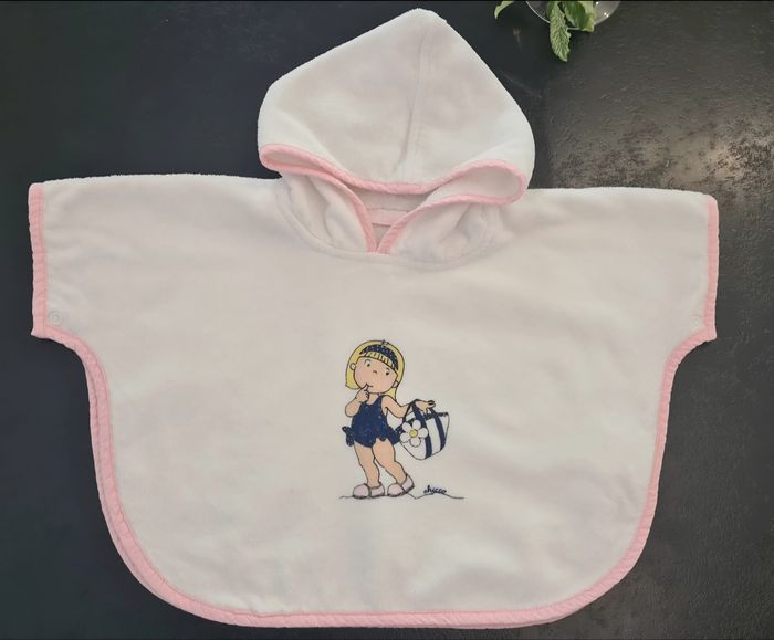 Cap de bain 1 mois tbe