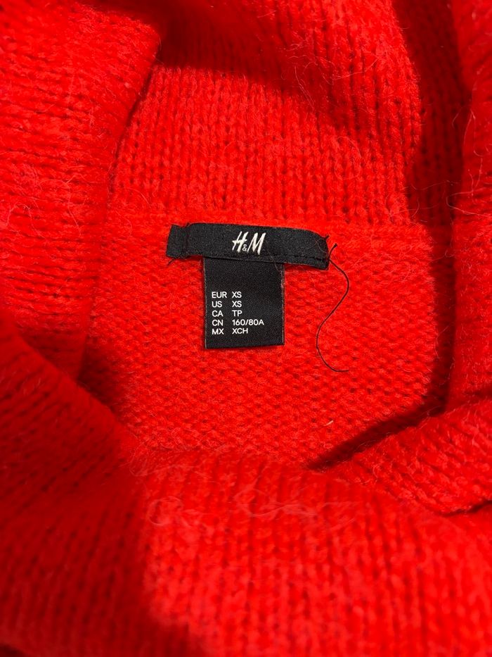 Pull col roulé rouge
