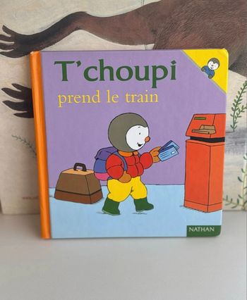 Tchoupi prend le train 