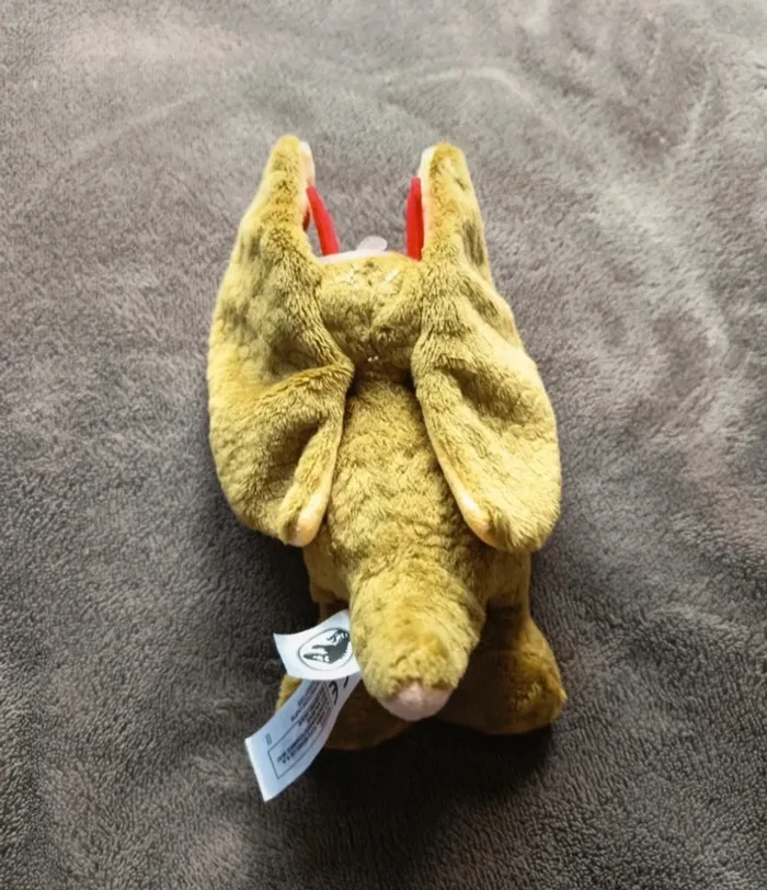 Petit dinosaure en peluche Jurassic World - photo numéro 3