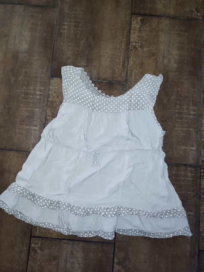 blouse sans manche taille 46 peu portée