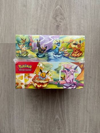 Display Pokémon Mini tins Évolutions Prismatiques EV8.5 Scellée