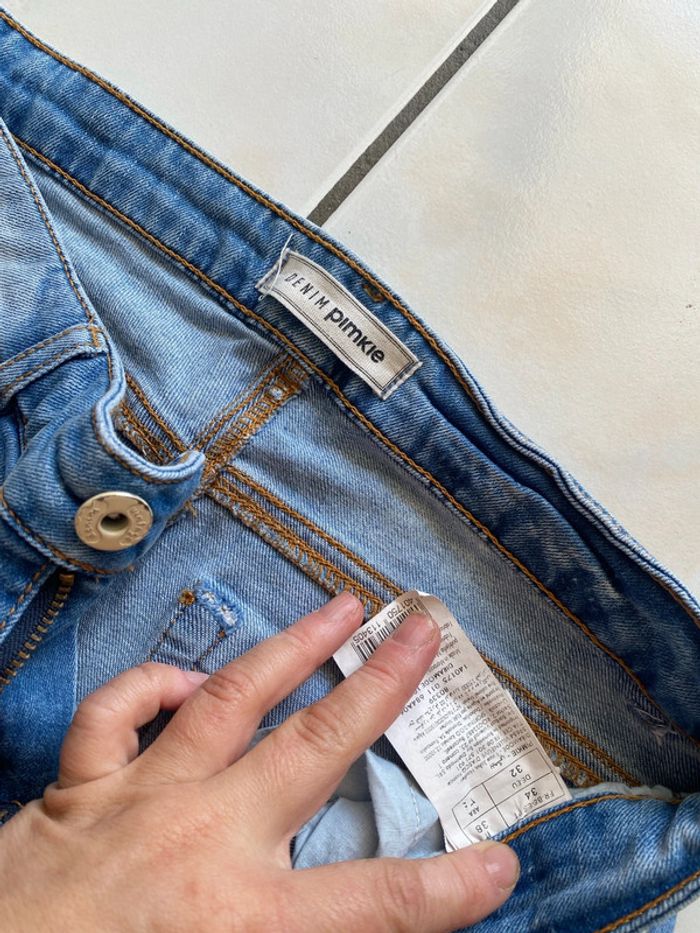 Lot de deux jeans déchirés, taille 34 - photo numéro 2