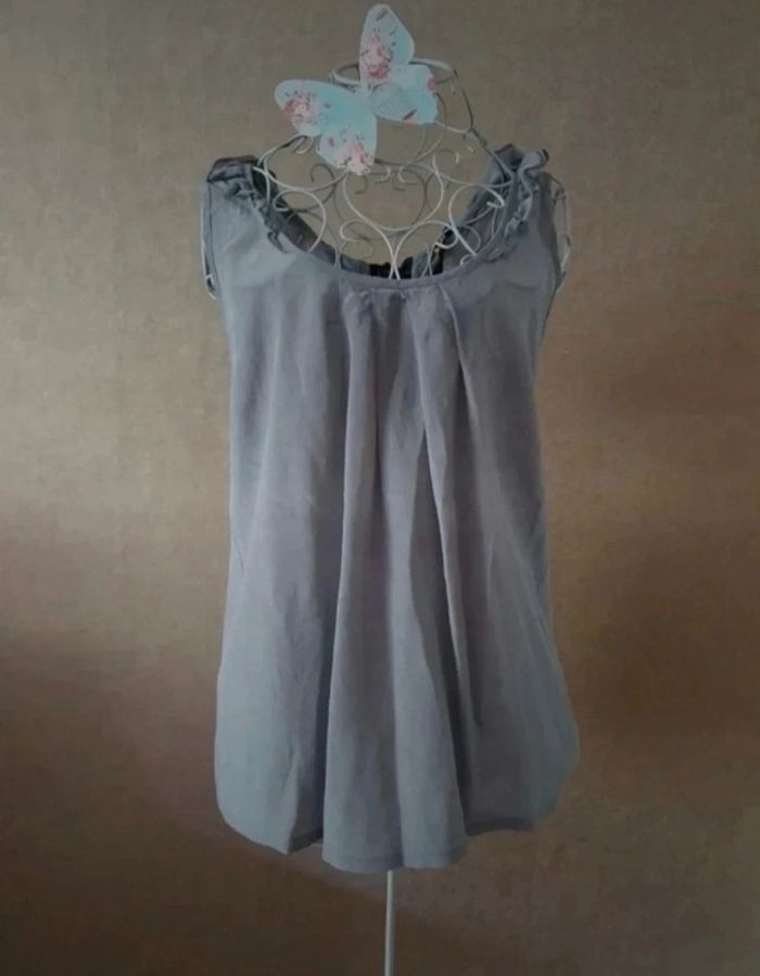 Blouse grise en soie bizarre taille xs