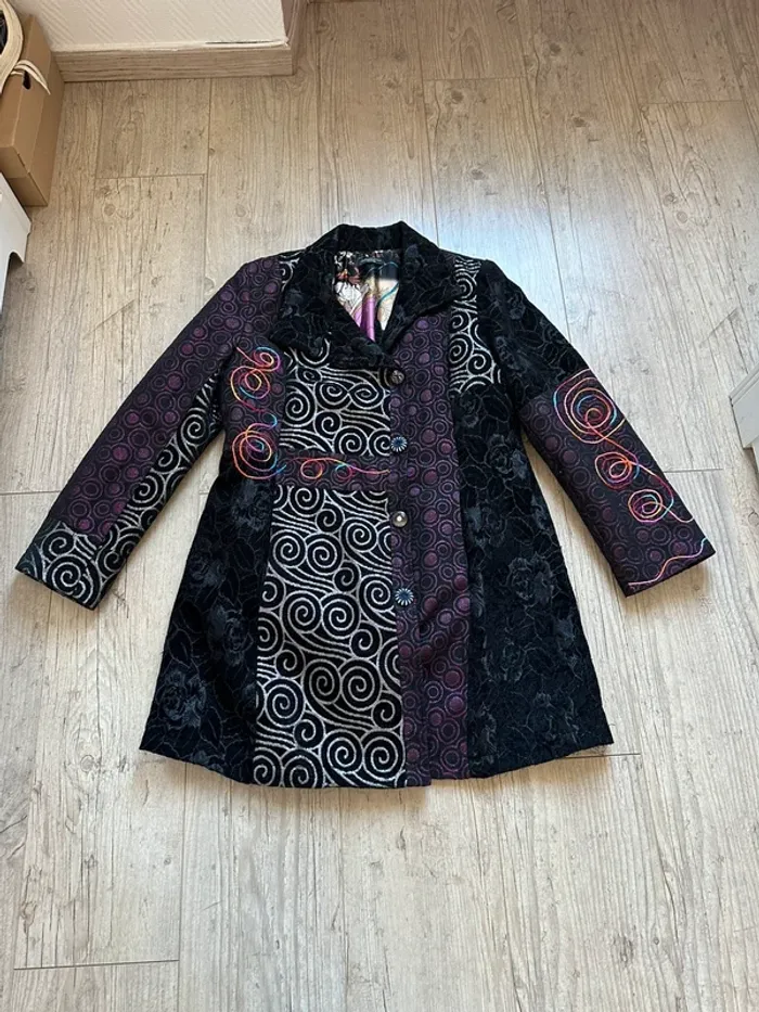 Manteau texto