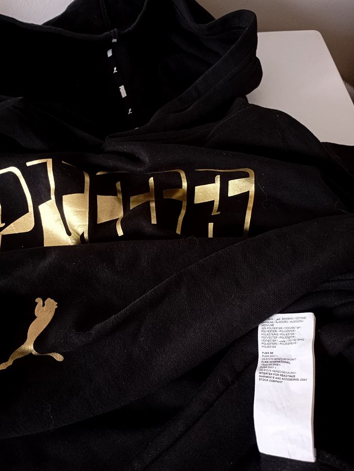 Sweat à capuche. Taille L. Noir et or . Coton et polyester . État neuf - photo numéro 9