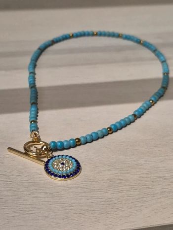Collier perles bleues & pendentif porte-bonheur neuf, acier inoxydable