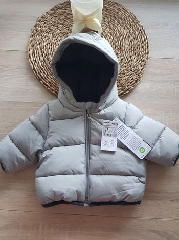 Doudoune à capuche grise