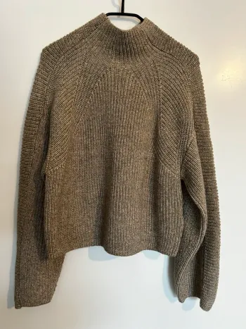 Pull col cheminé