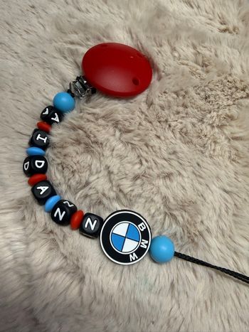 Attache tétine bmw