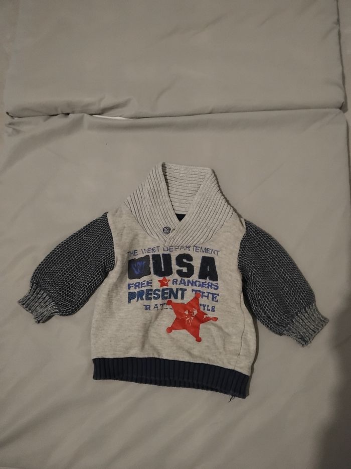 Pull un peu usé