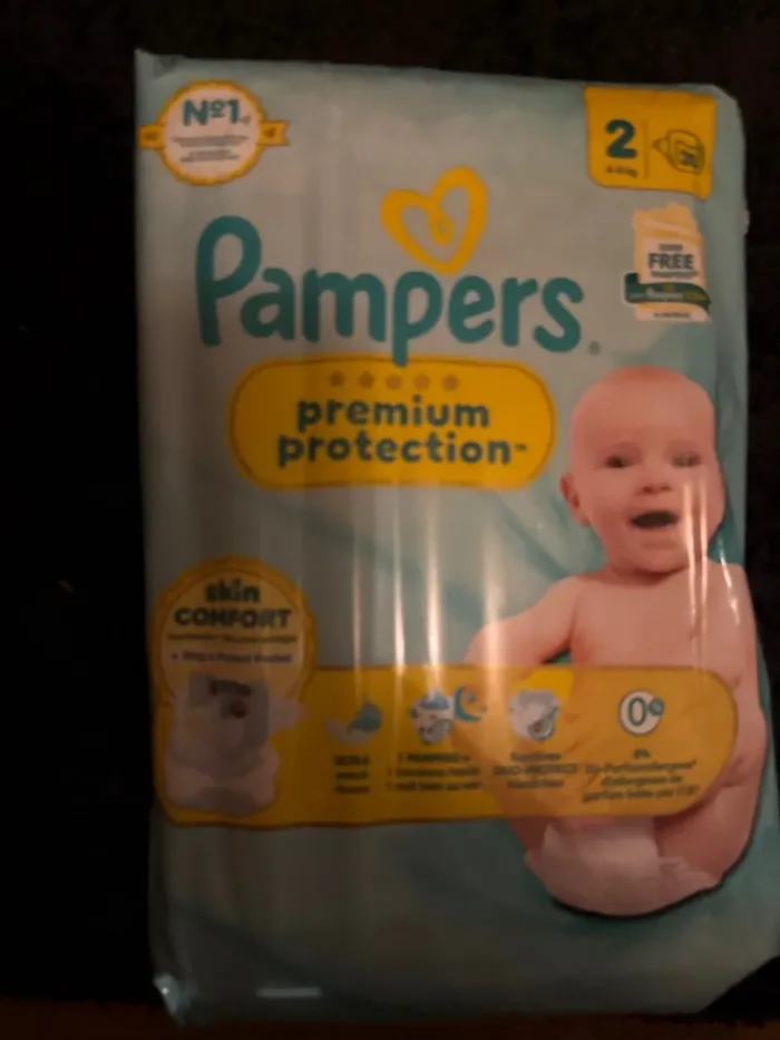 Couches prenuim pampers diapers t 2 - photo numéro 2