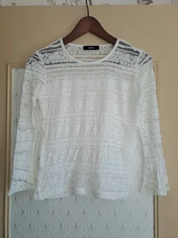 Haut sexy blanc femme mim dentelle S comme neuf. Je vends aussi le même en XS
