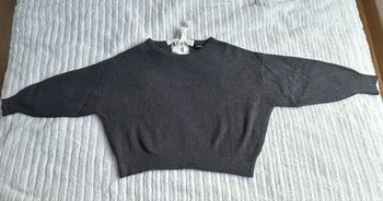 pull gris avec noeud 