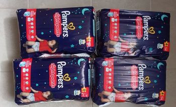 4 paquets de couches Pampers pants night taille 4