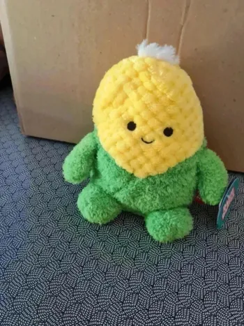 Peluche colby le maïs