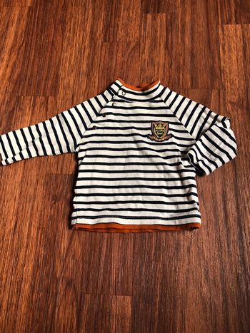 Pull rayé noir et blanc cassé