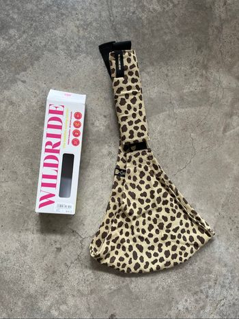 Porte bébé wildride léopard