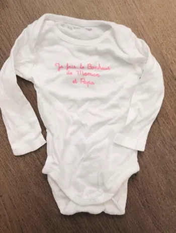 Body manches longues 6 mois en très bon état