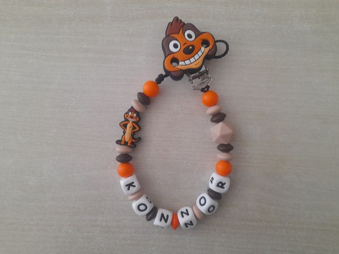 Attache tétine Timon