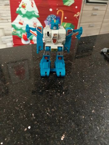Figurine robot avion transformer Takara bleu