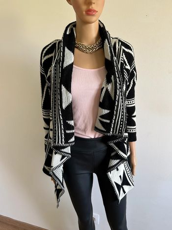 Gilet poncho noir et blanc taille unique état satisfaisant