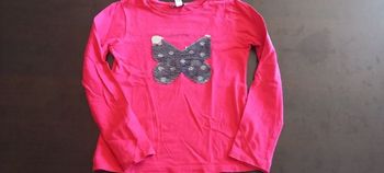 Haut rose papillon