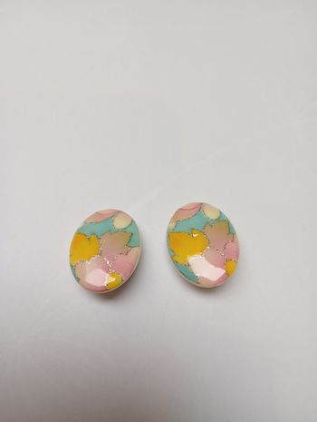 Fausses boucles d'oreilles ovales