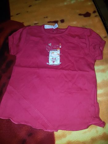 Tee shirt fuchsia. 1 an.