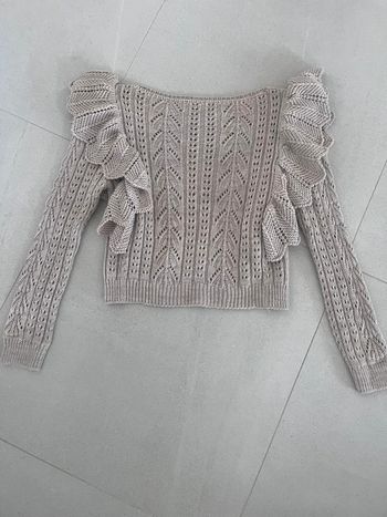Pull à volant