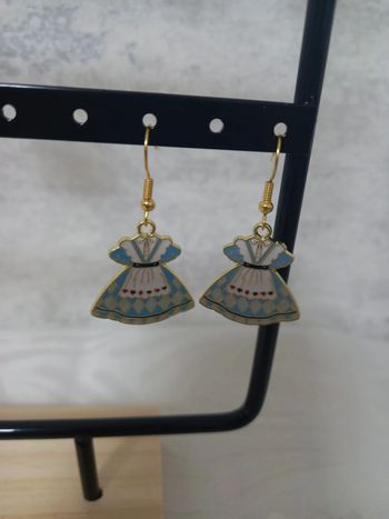 Boucle d'oreille alice aux pays des merveilles