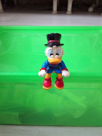 Figurine vintage Disney Picsou assis 6 cm