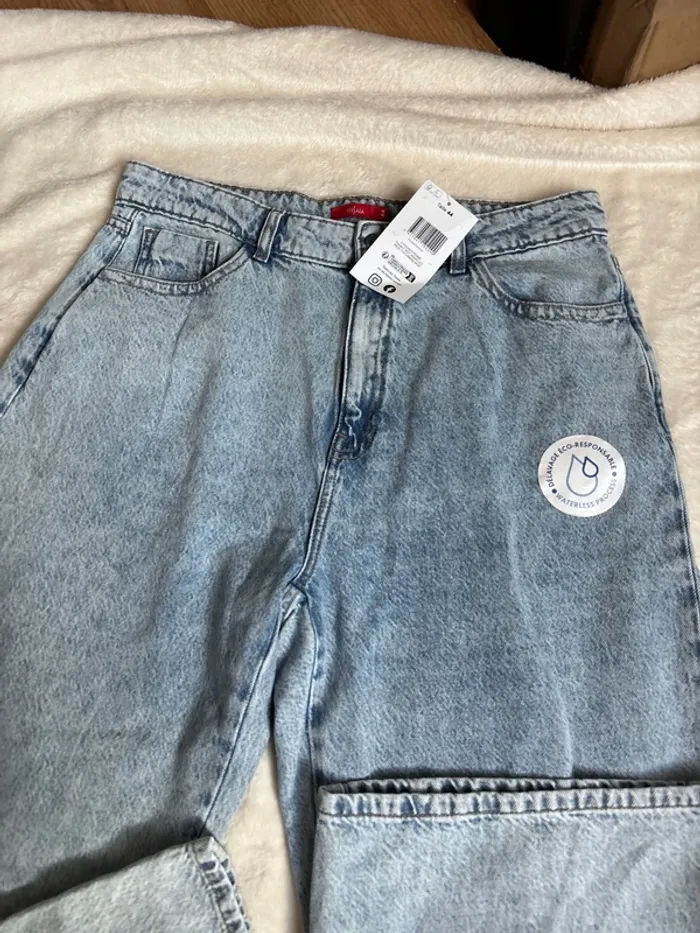 jean bleu clair taille haute jambe large neuf avec étiquette taille 44 ~ tissaia - photo numéro 3