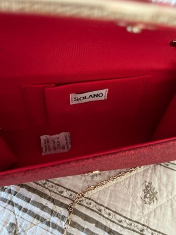 Pochette rouge pailletée lol