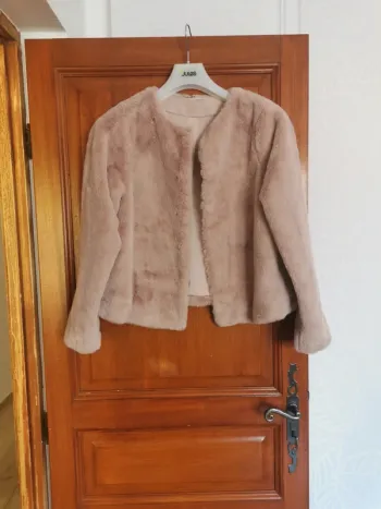 Veste fausse fourrure rose taille M H&M