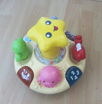 Toupie theme poissons