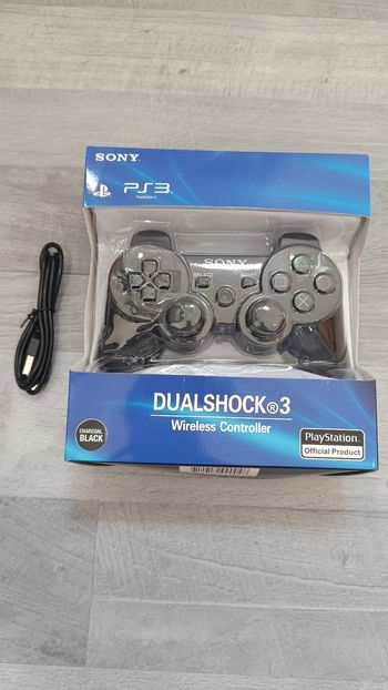 Manette PS3 neuve avec câble de recharge
