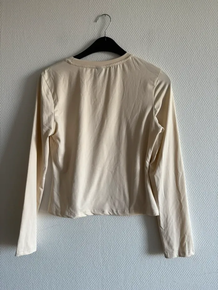 Manche longue beige - photo numéro 3