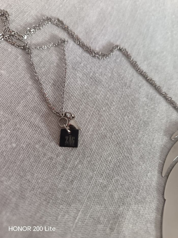 Collier plume argenté - photo numéro 7