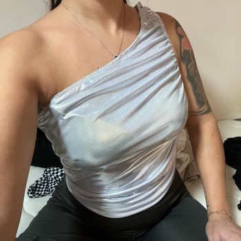Jolie haut brillant taille L
