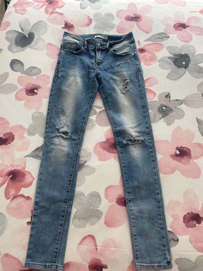 Jeans troué très bon état