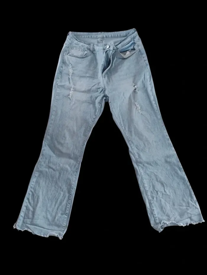 Jean troué grande taille