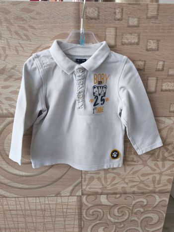 Polo blanc motif tigre