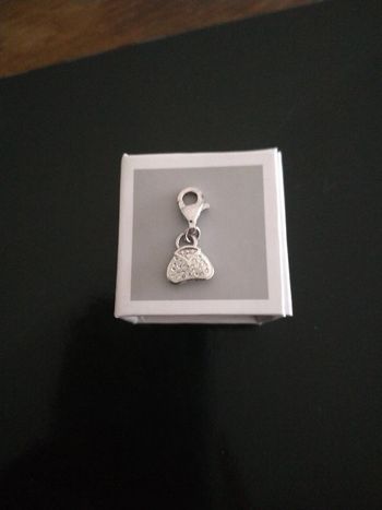 Pendentif sac à main strass argenté