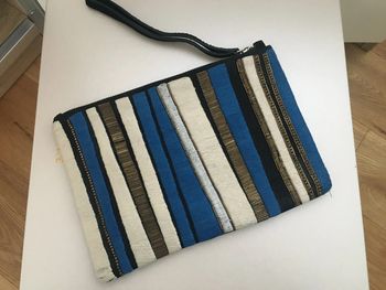 Pochette en cuir doré bleu beige Zign